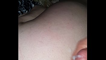 My milf wife fell asleep watching a movie and I fucked and cum on beautiful ass