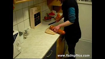 slutty wife fucks a giant meat sausage in the kitchen