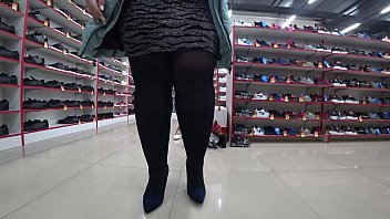 a foot fetish in a public place and a fetish with peeping under a short skirt bbw with a big ass in a shoe store