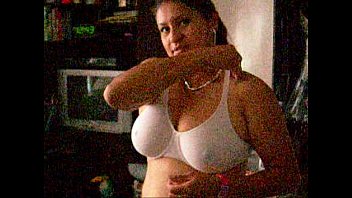 Araceli Anderson from Izcalli, Mexico putting on her bra.