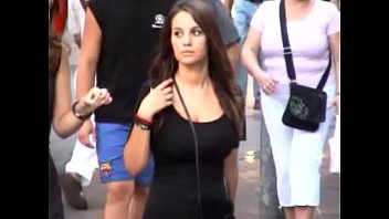 Beautiful busty candid teen w tight black top in the street, bouncing boobs.