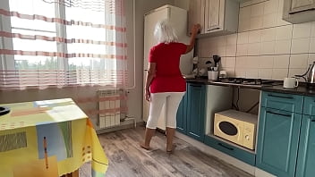 Stepmom with a big ass sucks dick and has anal sex with her in the kitchen